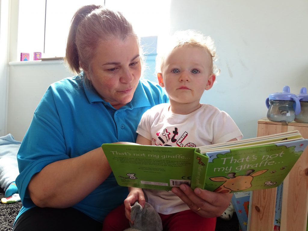 Anna Reading to Child